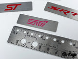 Custom Brushed Steel Console Badges